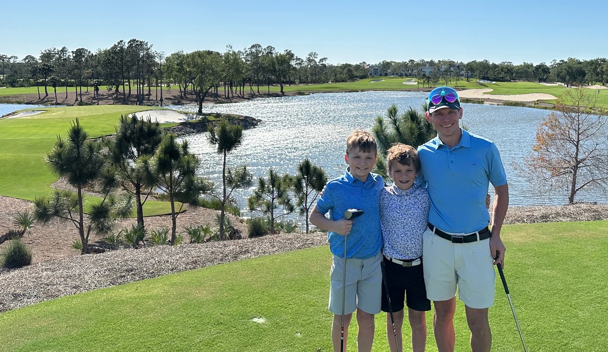 Steve Ferguson with his boys golfing